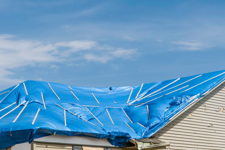 Roof tarp installation by Summit Roofing & Solar, LLC